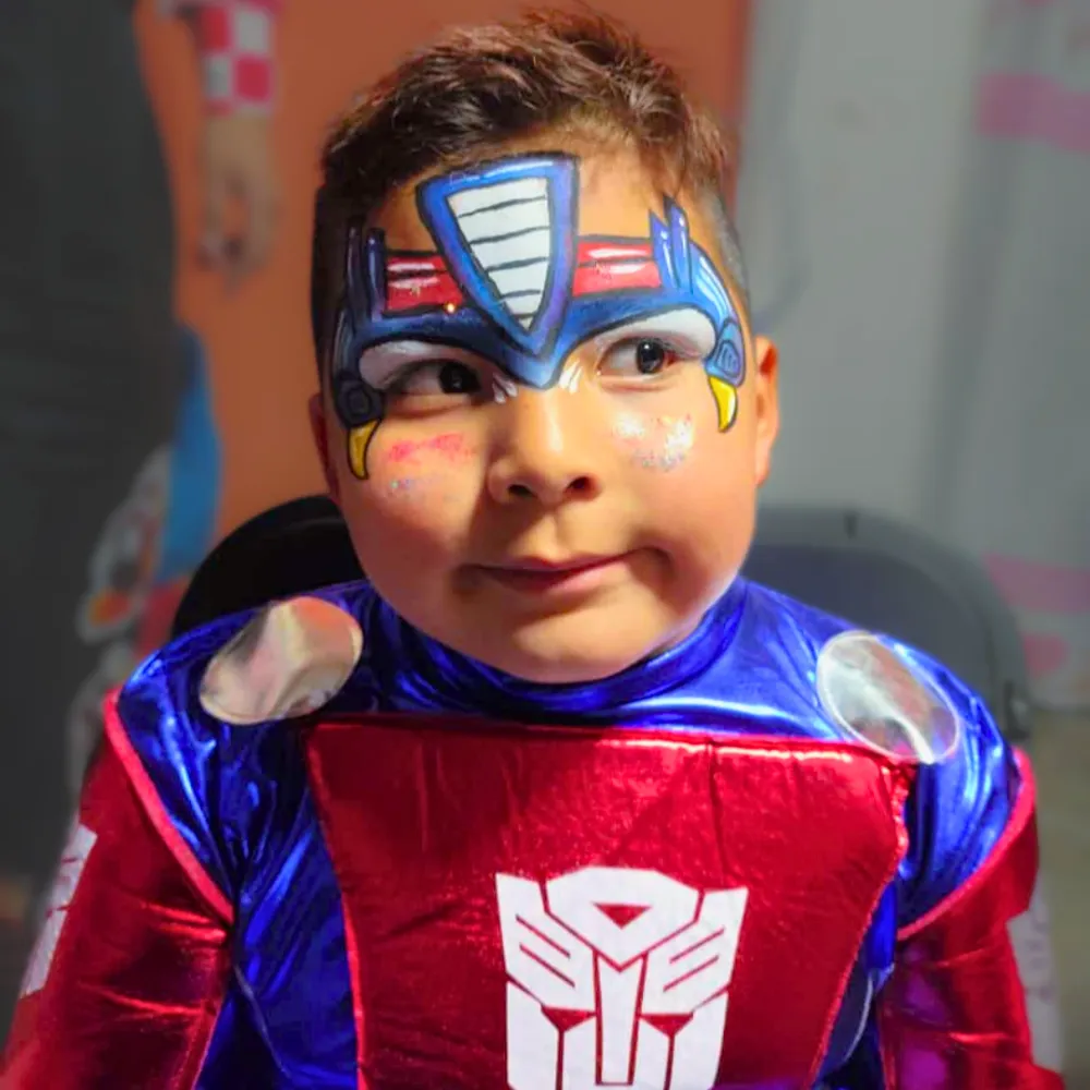 Pintacaritas de máscara de Optimus Prime de Transformers en azul metálico y rojo para niños en CDMX y EDOMEX
