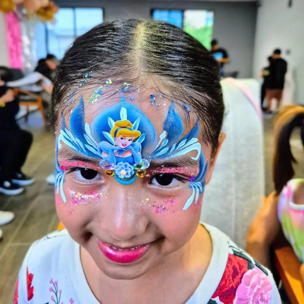 Pintacaritas de princesa Cenicienta con corona azul celeste gemas 3D y glitter para niñas en CDMX y EDOMEX